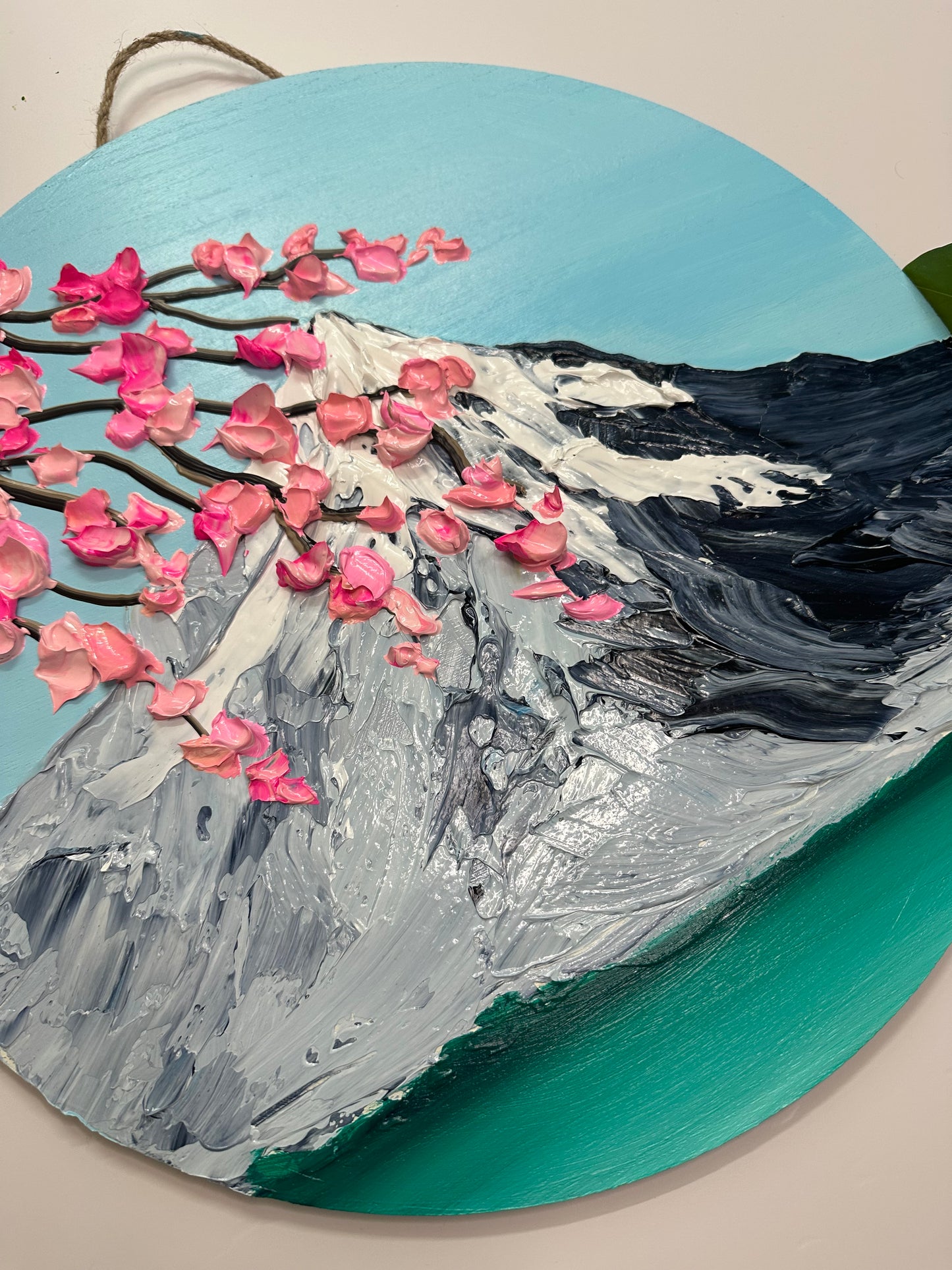 Simply Here – Round Textured Cherry Blossom Painting with Snowy Mountains and Water | Modern Nature Wall Art