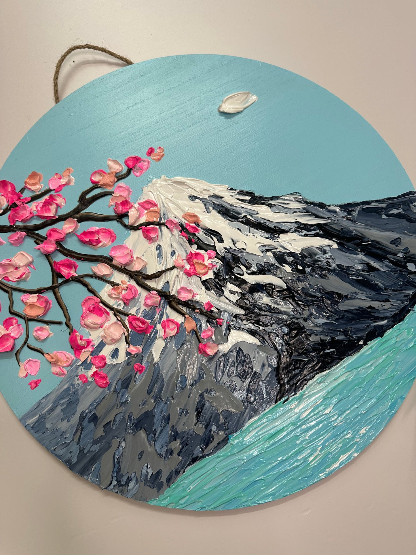 Simply Here – Round Textured Cherry Blossom Painting with Snowy Mountains and Water | Modern Nature Wall Art
